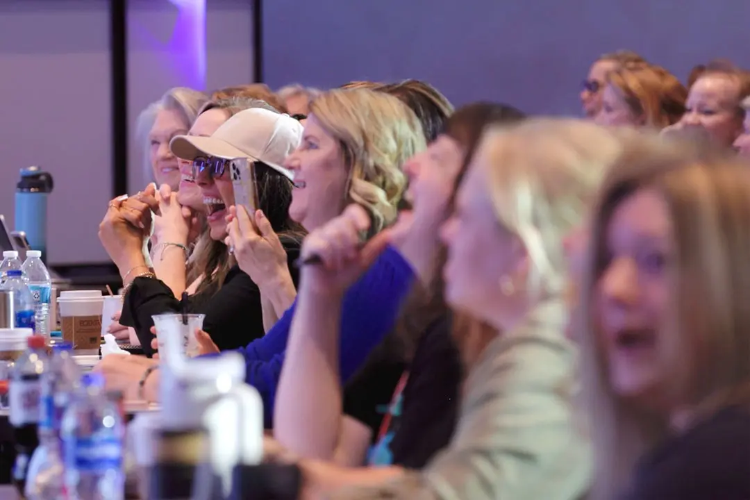 Photo of woman speaking at a conference